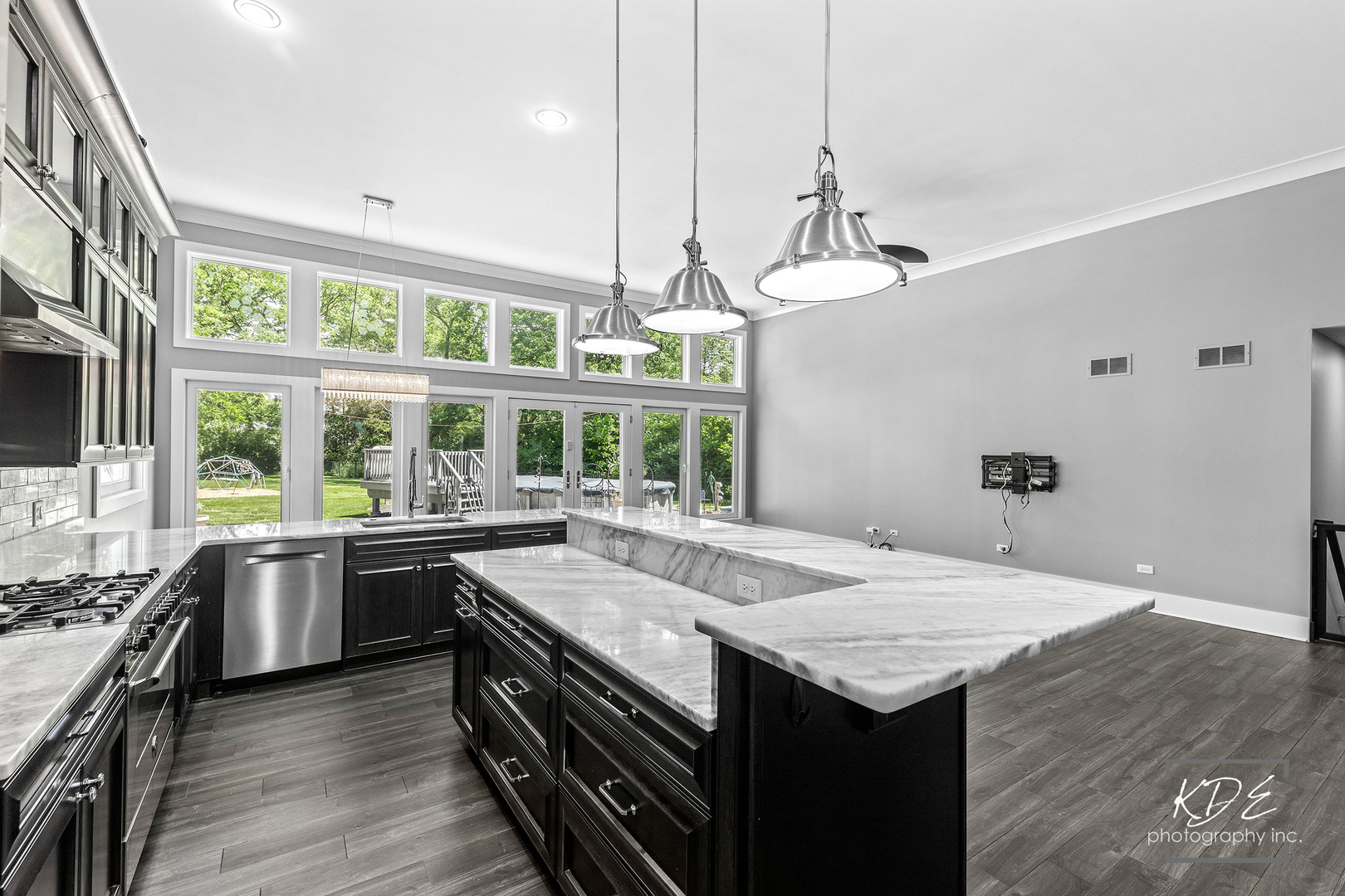 27W320 80th Street Naperville, IL 60565 - Photo 10 of 37 a kitchen with a stove and a center island