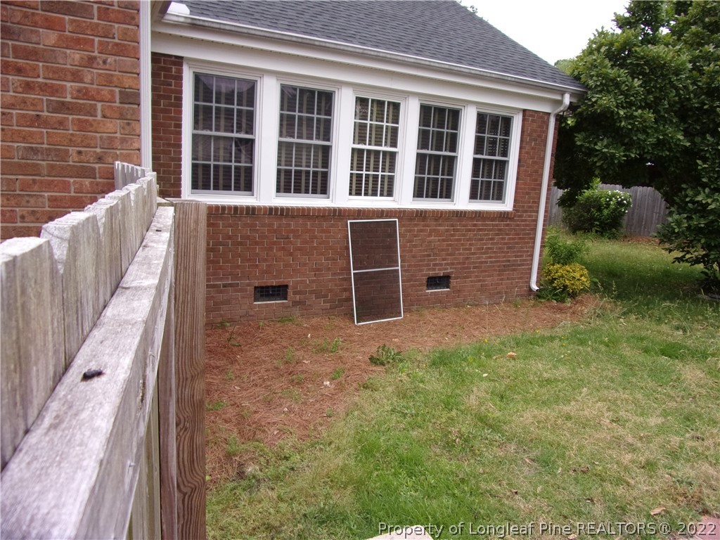 1503 Fairview Street Dunn, NC 28334 - Photo 2 of 10 a view of front of a house with a yard