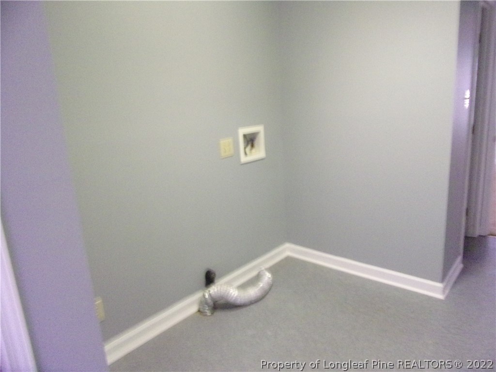 1503 Fairview Street Dunn, NC 28334 - Photo 5 of 10 a room with a window