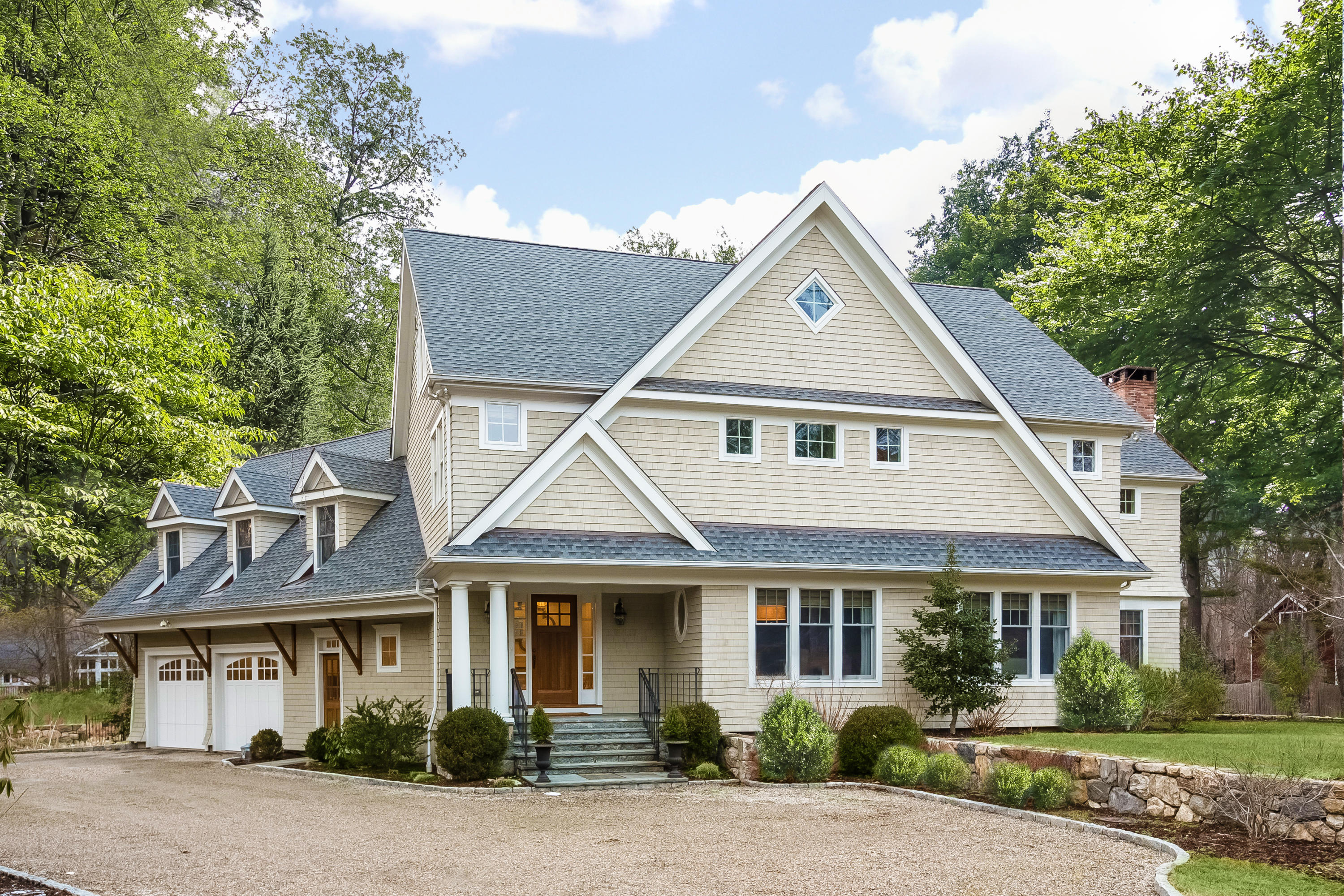 305 Middlesex Road Darien, CT 06820 - Photo 1 of 35 a front view of a house with a yard