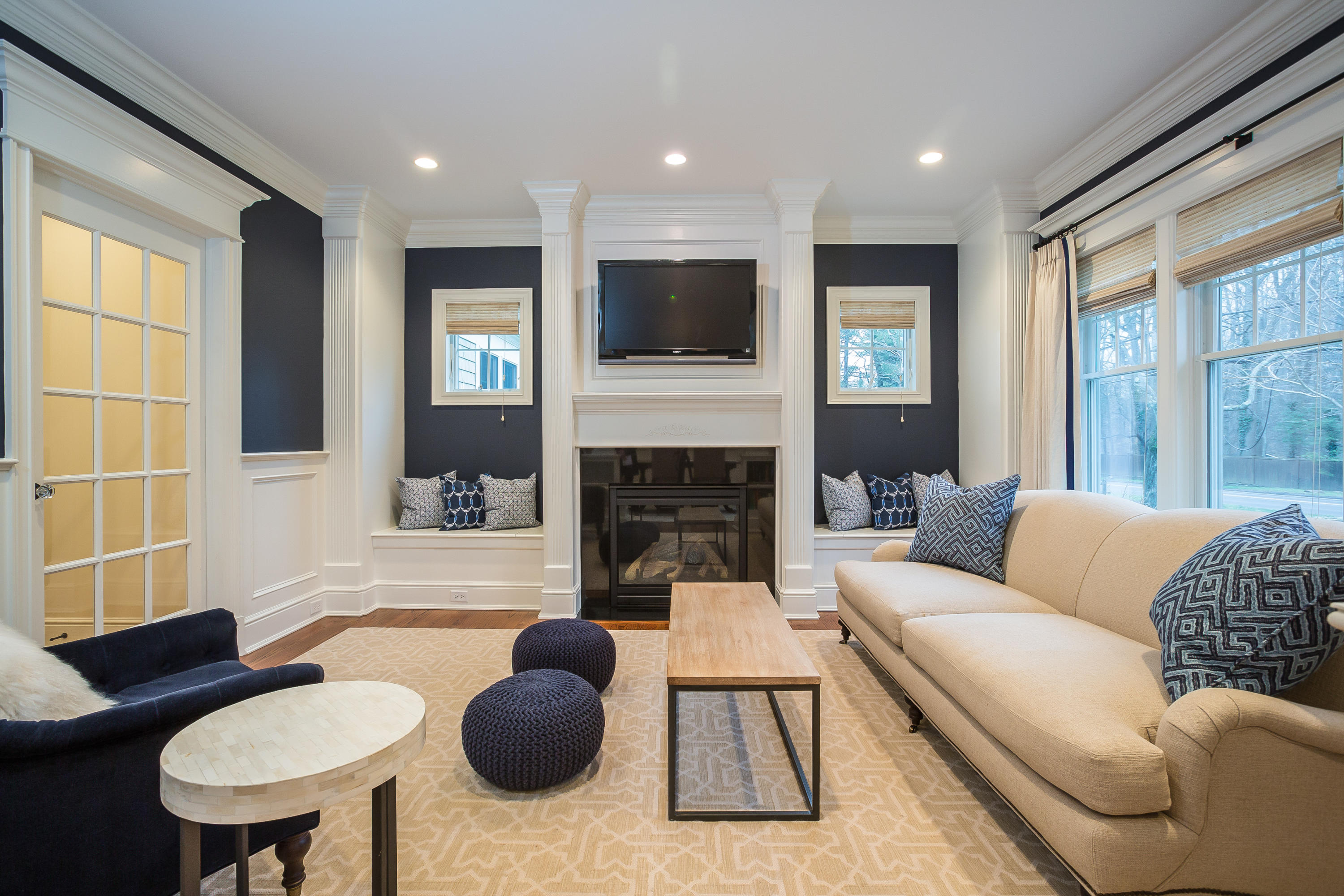 305 Middlesex Road Darien, CT 06820 - Photo 13 of 35 a living room with furniture a flat screen tv and a fireplace