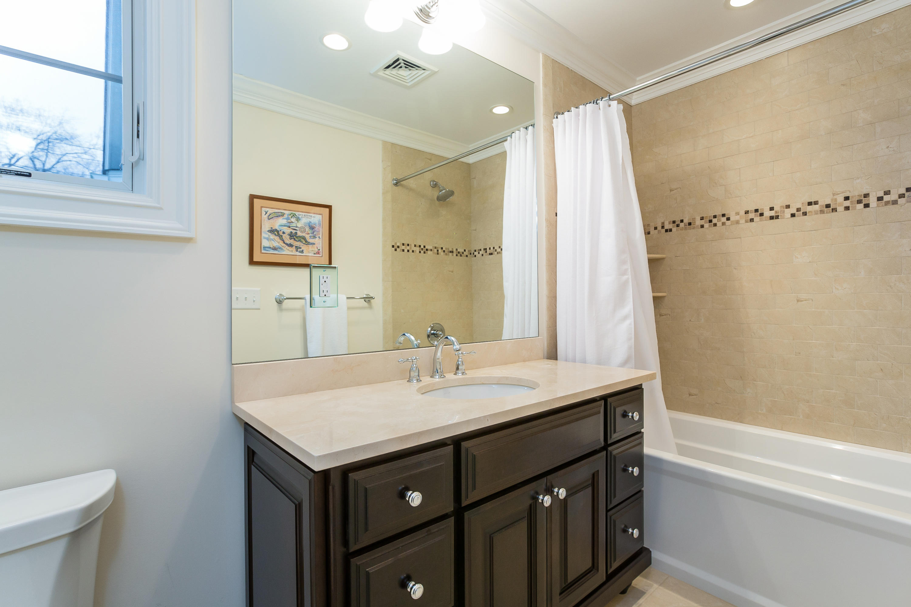 305 Middlesex Road Darien, CT 06820 - Photo 22 of 35 a bathroom with a sink and a mirror