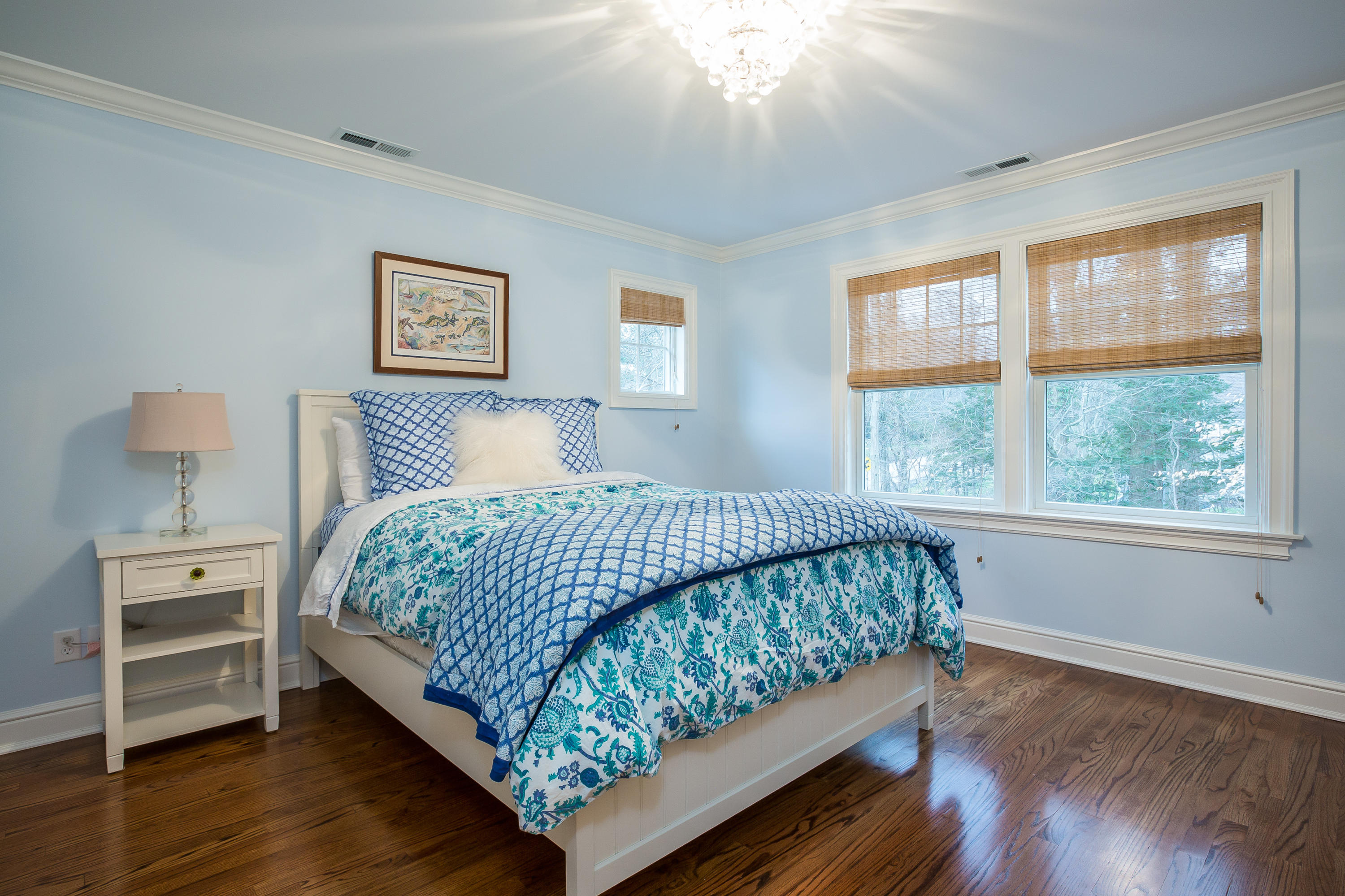 305 Middlesex Road Darien, CT 06820 - Photo 26 of 35 a bedroom with a large bed and a tv