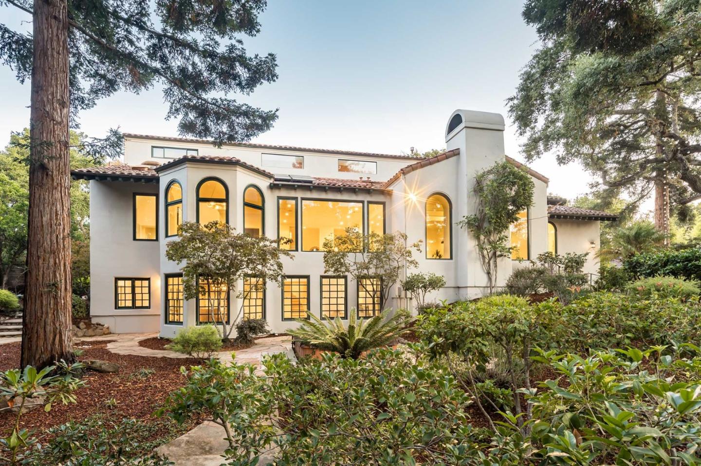 953 Roble Ridge Road Palo Alto, CA 94306 - Photo 1 of 50 a front view of a house with garden