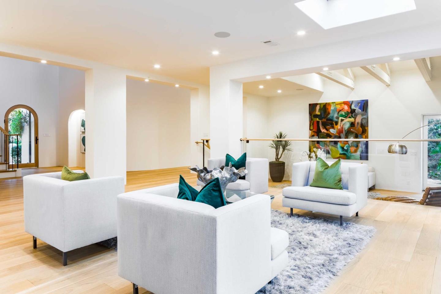 953 Roble Ridge Road Palo Alto, CA 94306 - Photo 11 of 50 a living room with furniture and a flat screen tv