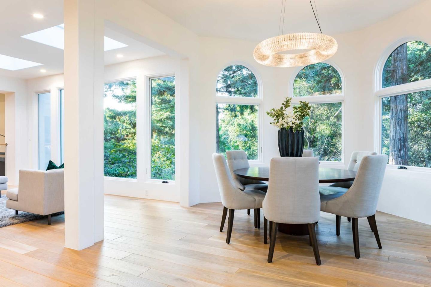953 Roble Ridge Road Palo Alto, CA 94306 - Photo 14 of 50 a view of a dining room with furniture window and wooden floor