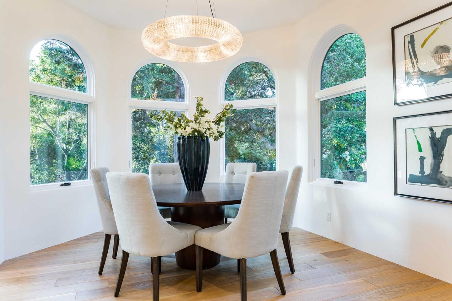 953 Roble Ridge Road Palo Alto, CA 94306 - Photo 15 of 50 a view of a dining room with furniture window and wooden floor