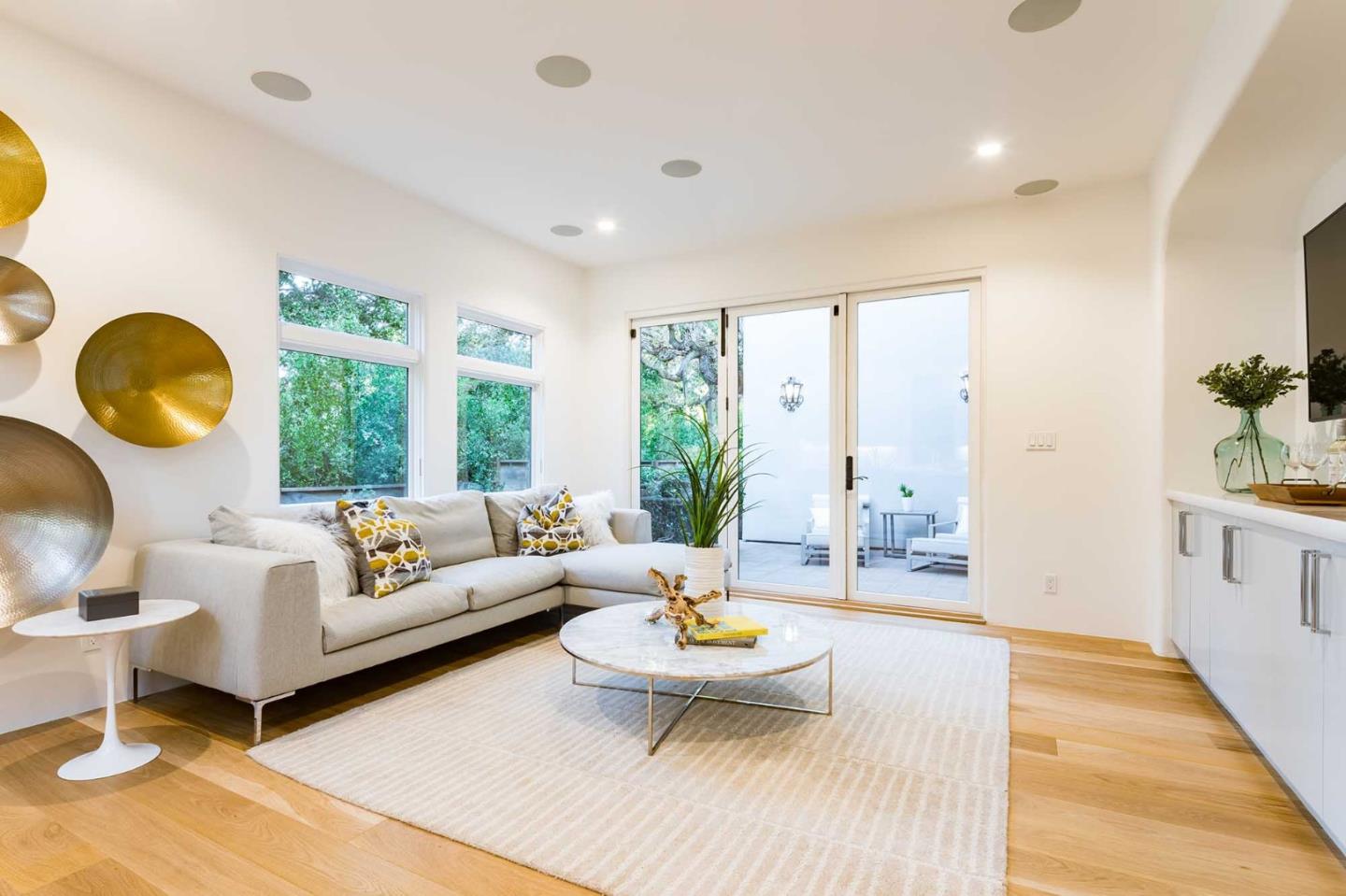 953 Roble Ridge Road Palo Alto, CA 94306 - Photo 20 of 50 a living room with furniture and a large window