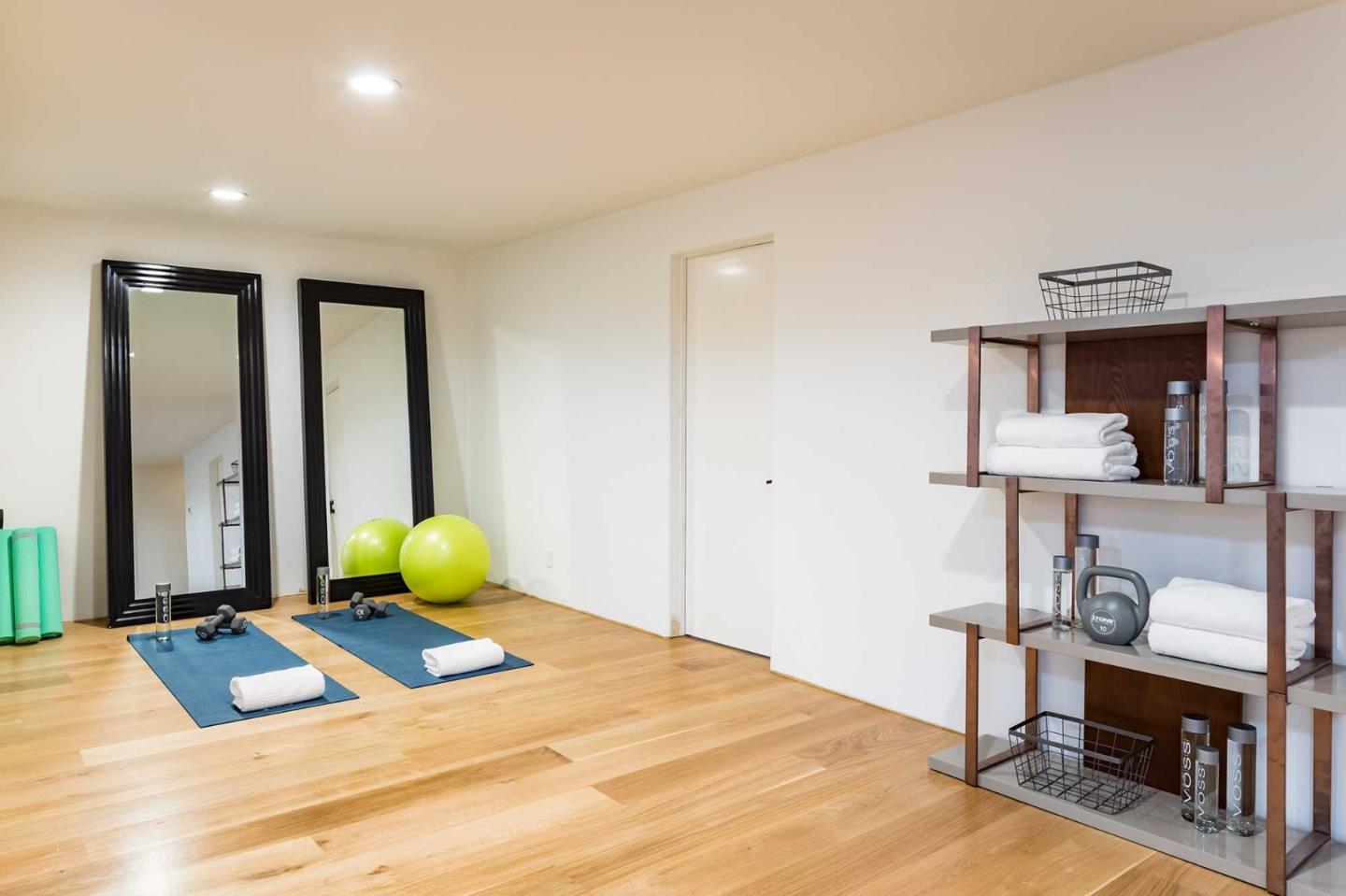 953 Roble Ridge Road Palo Alto, CA 94306 - Photo 25 of 50 a bedroom with a bed a desk and chair