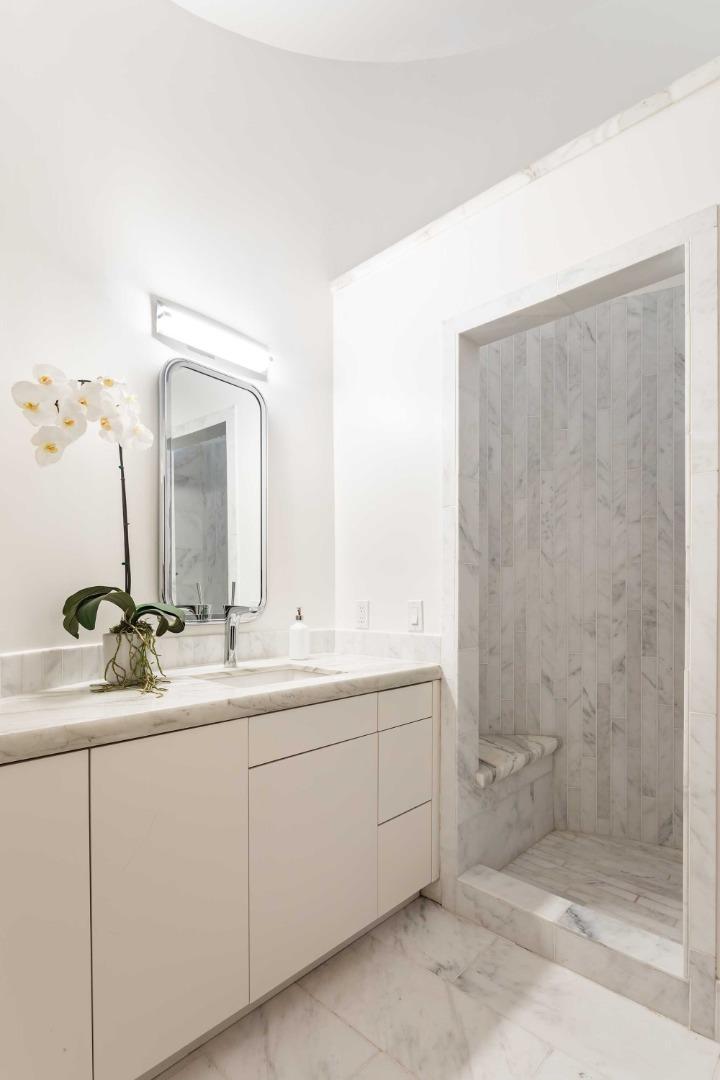 953 Roble Ridge Road Palo Alto, CA 94306 - Photo 29 of 50 a bathroom with a double vanity sink and mirror
