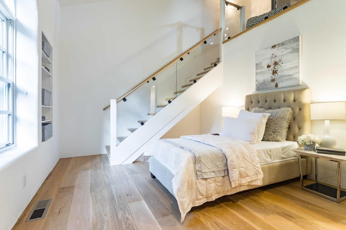 953 Roble Ridge Road Palo Alto, CA 94306 - Photo 33 of 50 a bedroom with a bed and a window