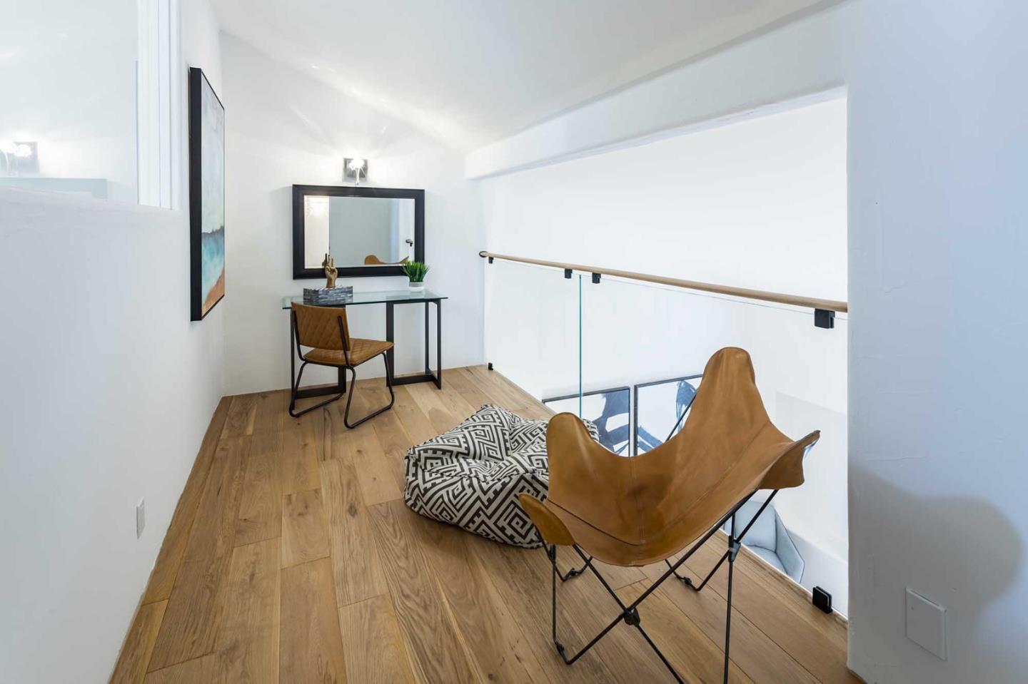 953 Roble Ridge Road Palo Alto, CA 94306 - Photo 35 of 50 a living room with furniture and a flat screen tv