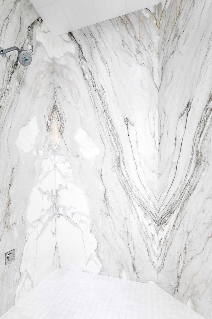 953 Roble Ridge Road Palo Alto, CA 94306 - Photo 38 of 50 a white bed sitting in a bathroom and with a window