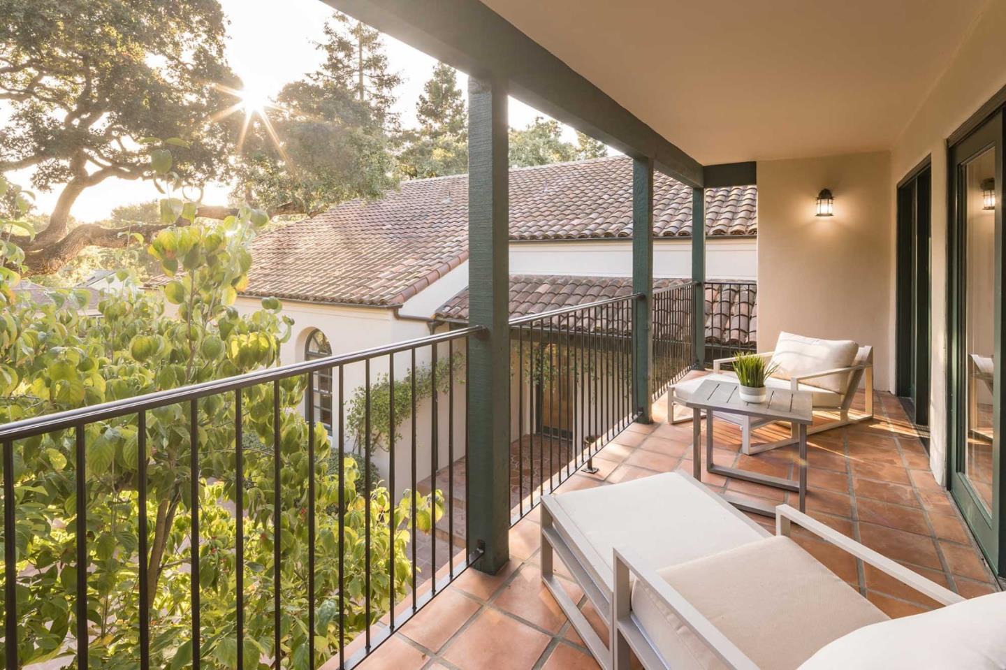 953 Roble Ridge Road Palo Alto, CA 94306 - Photo 44 of 50 a balcony view with a large window and sitting space
