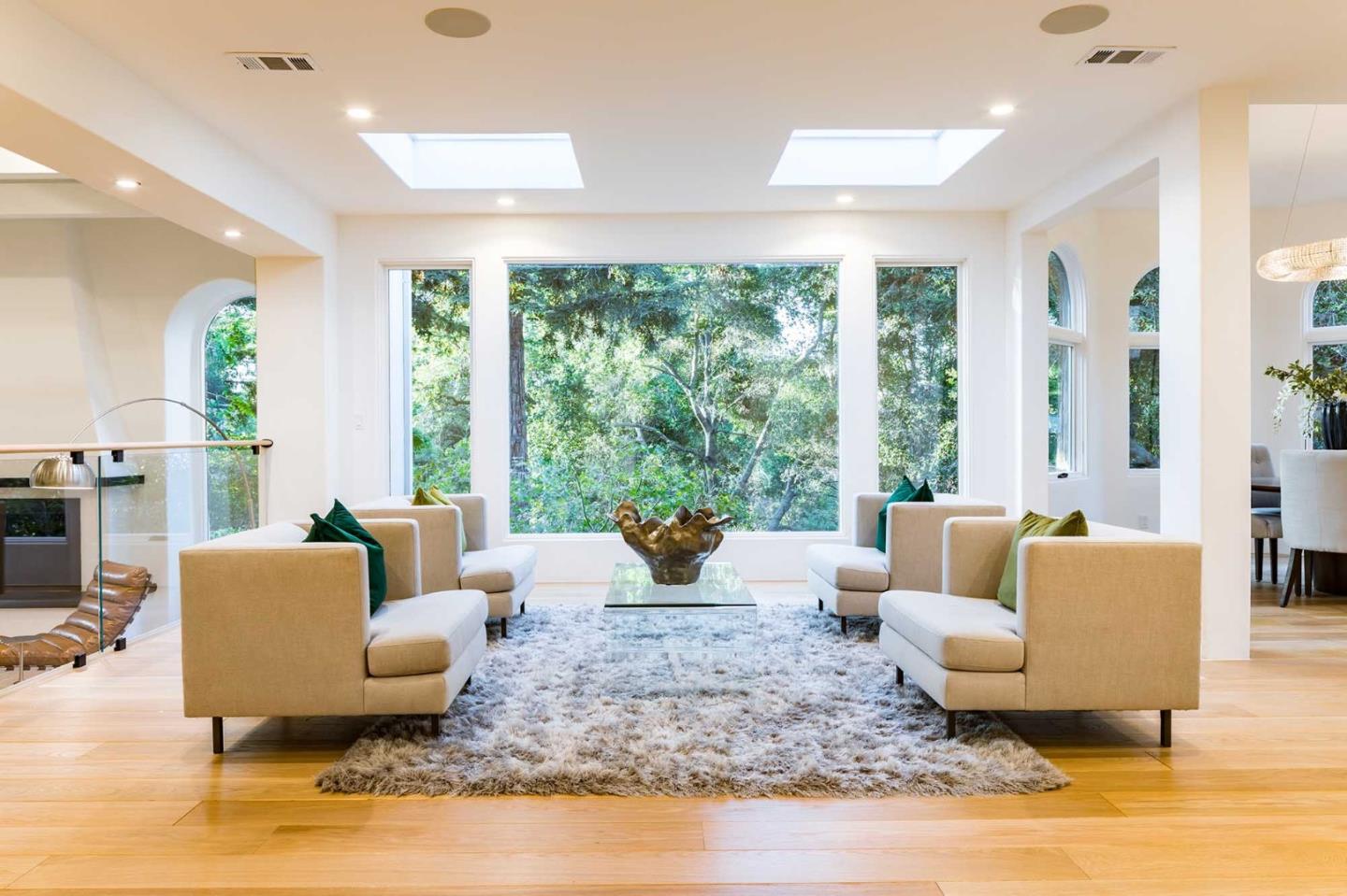 953 Roble Ridge Road Palo Alto, CA 94306 - Photo 10 of 50 a living room with furniture and a large window