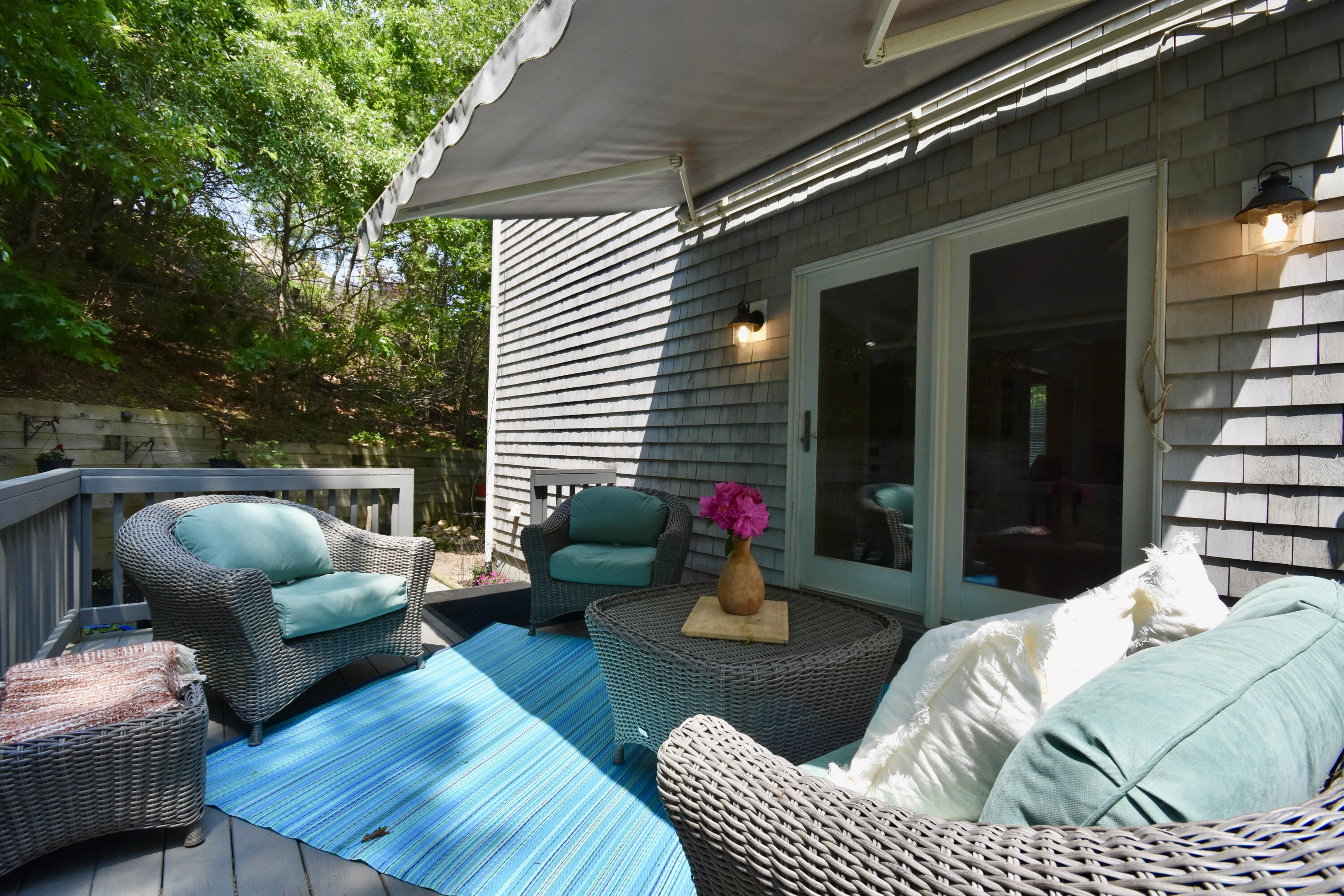 24 Sheppard Road Sagamore Beach, MA 02562 - Photo 38 of 41 a outdoor living space with furniture and a potted plant