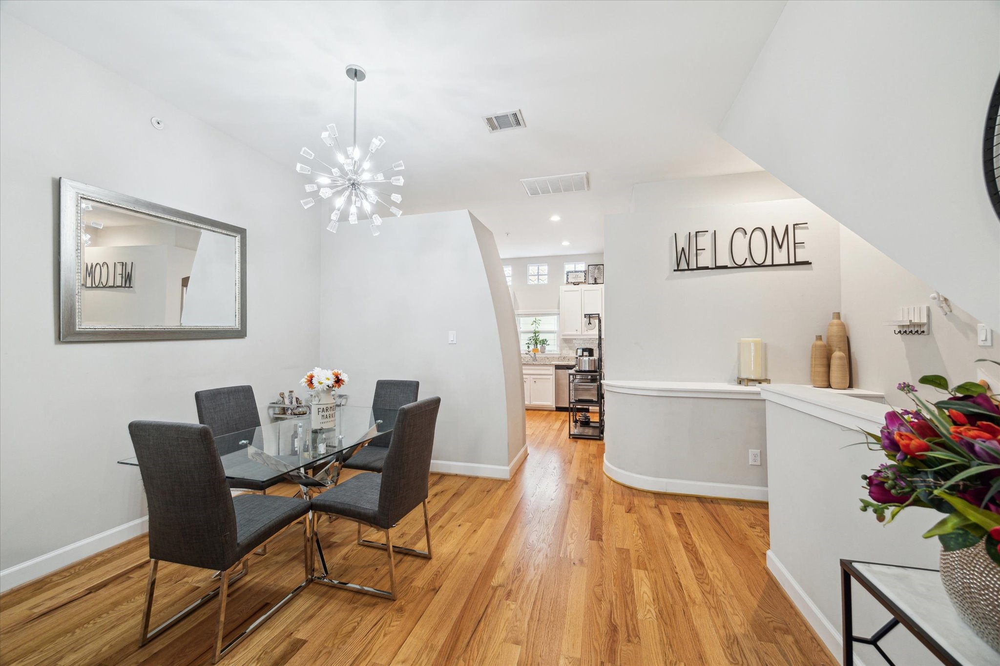 8705 Bryam Street, Unit 2003 Houston, TX 77061 - Photo 7 of 14 a view of a dining room with furniture and wooden floor