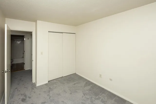 an empty room with closet