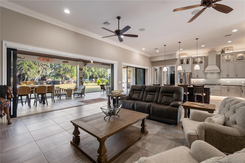 3738 Kissimmee Park Road St. Cloud, FL 34772 - Photo 14 of 62 a living room with furniture and a large window