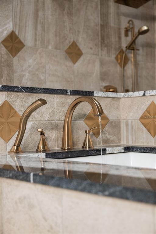 3738 Kissimmee Park Road St. Cloud, FL 34772 - Photo 33 of 62 a closeup of a sink and a mirror