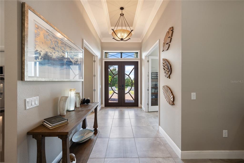 3738 Kissimmee Park Road St. Cloud, FL 34772 - Photo 10 of 62 a view of a hallway with furniture and front door