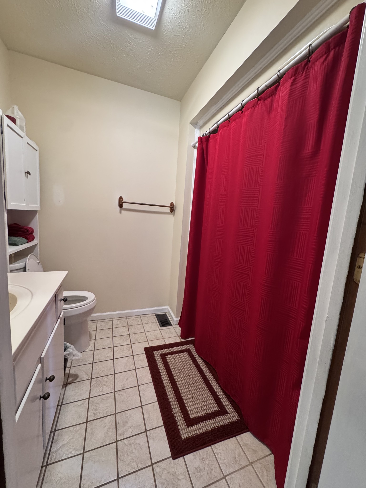 267 Difficult Road Pleasant Shade, TN 37145 - Photo 18 of 20 a view of a bathroom with a sink and toilet