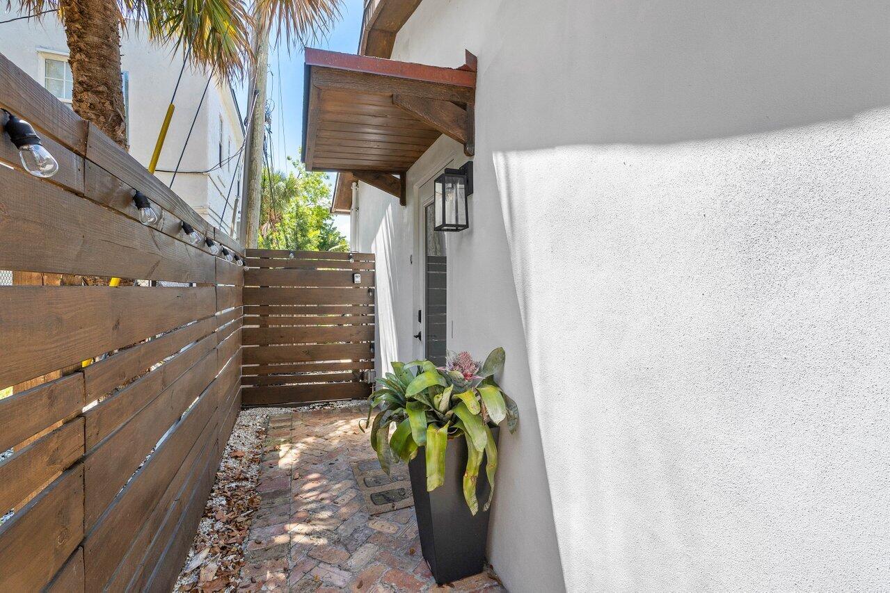 706 Sunset Road, Unit C West Palm Beach, FL 33401 - Photo 3 of 15 a view of a potted plants with sky view