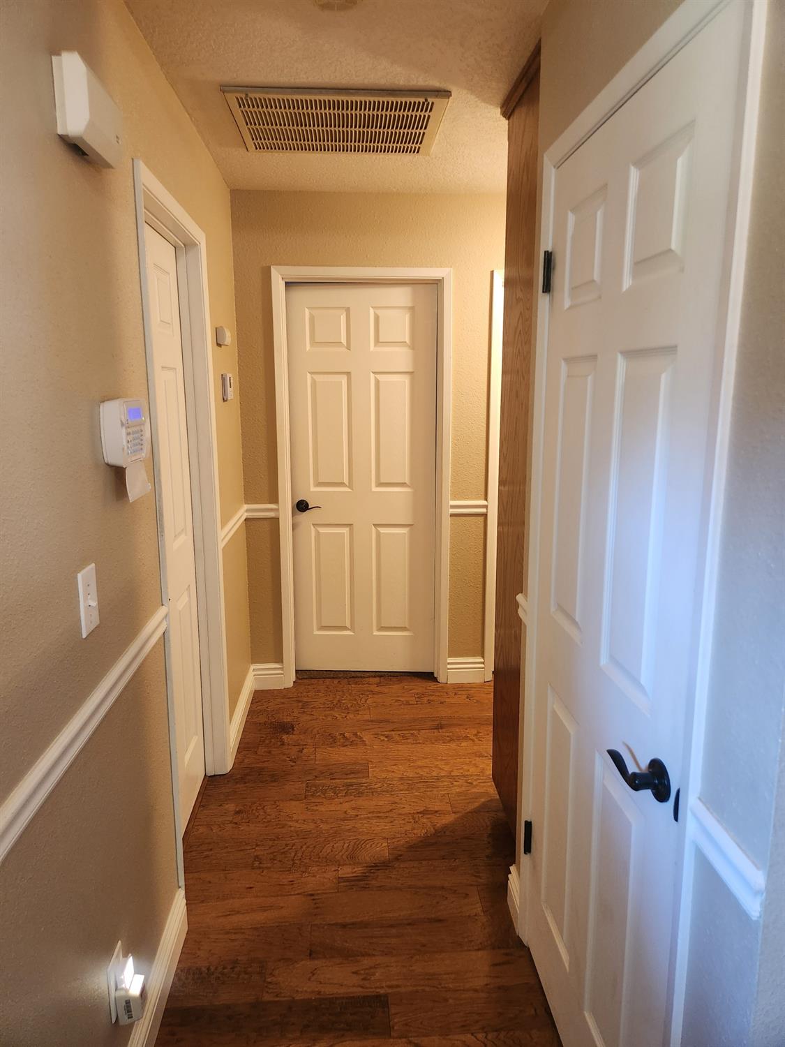 777 Jordanolo Drive Ripon, CA 95366 - Photo 22 of 61 a view of a bathroom with wooden floor