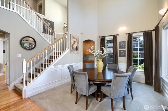 a view of a dining room with furniture window and entryway