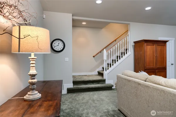 a living room with furniture and a table