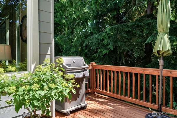 a view of a chairs and table in the patio