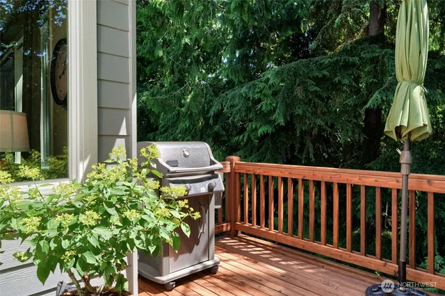 a view of a chairs and table in the patio