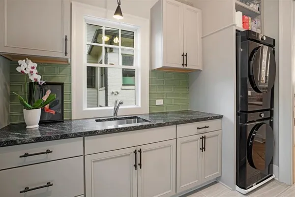 a hallway with a large window and mirror