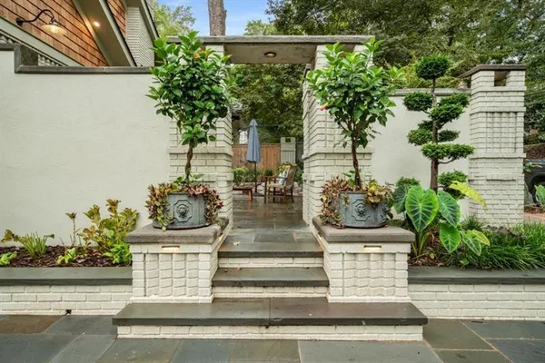 a view of statue in a garden