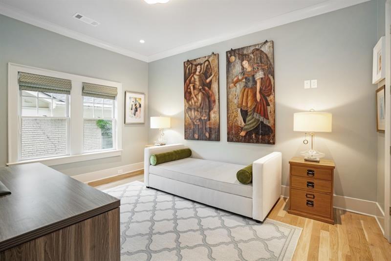 407 8th Street Northeast Atlanta, GA 30309 - Photo 25 of 34 a living room with furniture and a large window