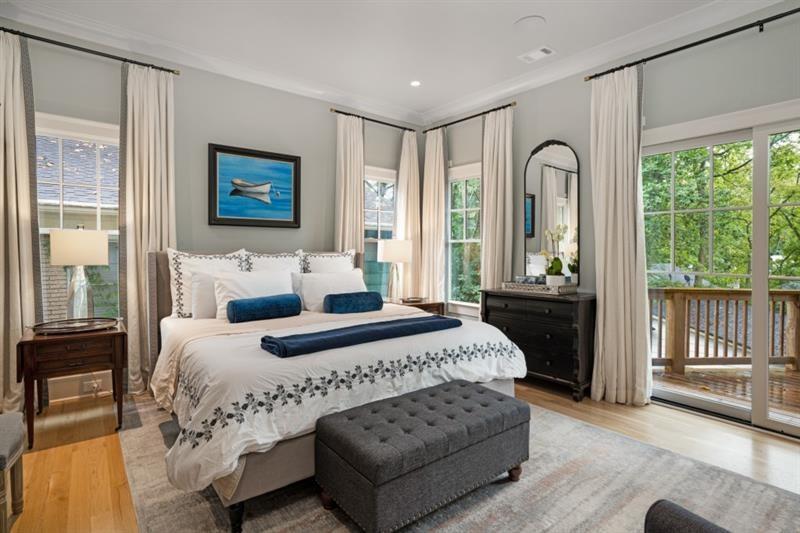 407 8th Street Northeast Atlanta, GA 30309 - Photo 28 of 34 a bedroom with bed and a large window
