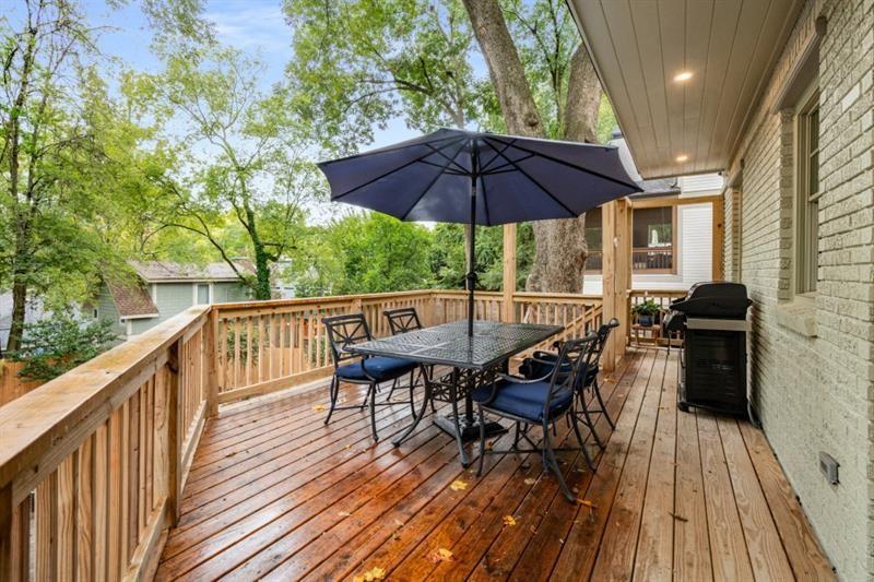 407 8th Street Northeast Atlanta, GA 30309 - Photo 33 of 34 a view of a deck with wooden floor and outdoor seating
