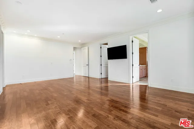 a view of a livingroom with wooden floor