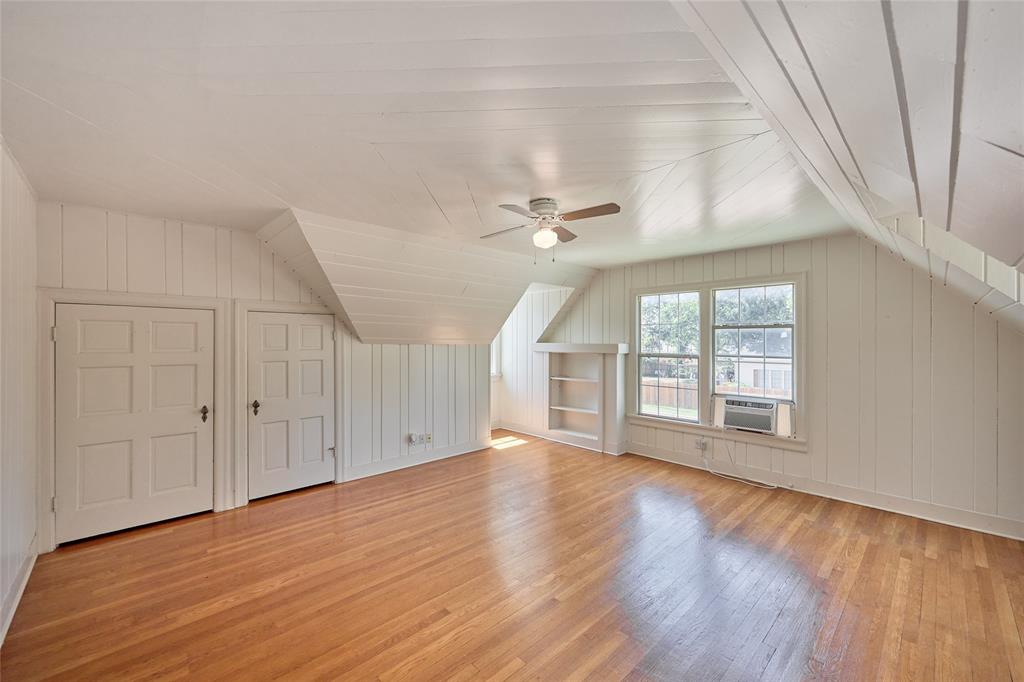 811 West Main Street Olney, TX 76374 - Photo 32 of 40 a view of an empty room with a window and wooden floor