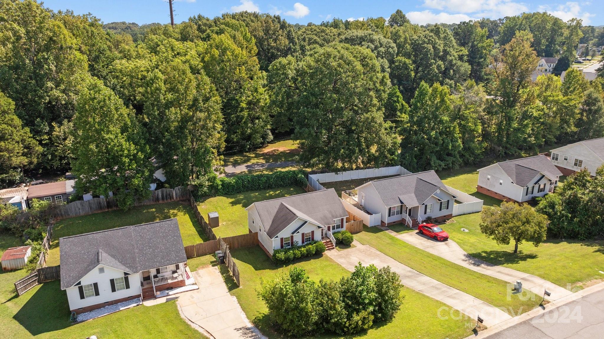 4340 Frank Vance Road Charlotte, NC 28216 - Photo 28 of 31 an aerial view of a house with swimming pool and outdoor seating