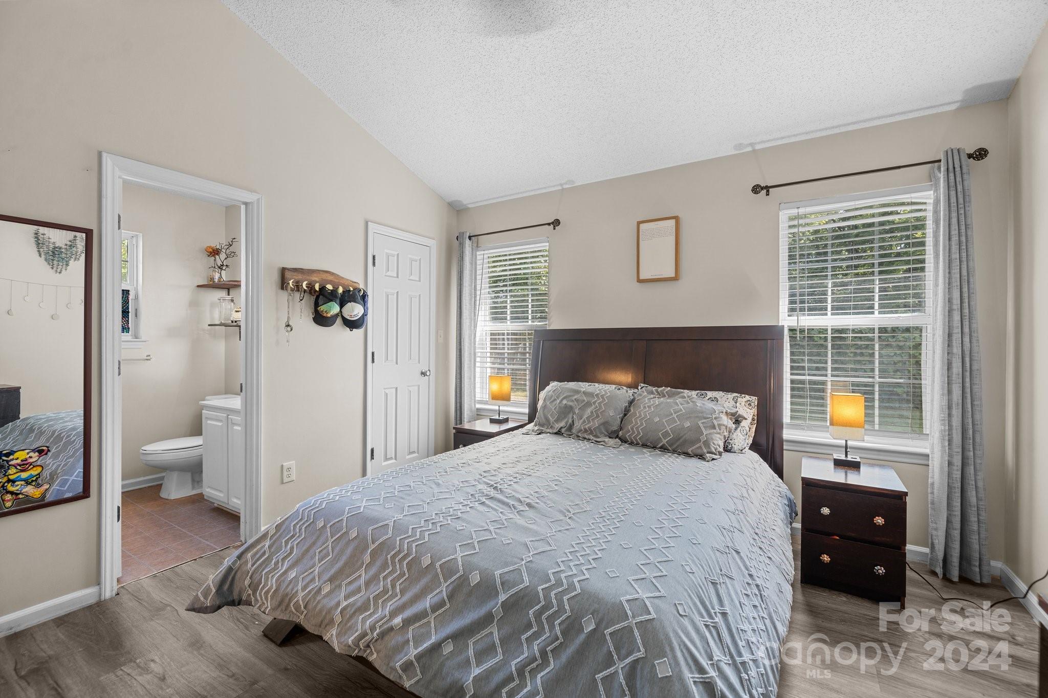 4340 Frank Vance Road Charlotte, NC 28216 - Photo 4 of 31 a bedroom with a bed and a window