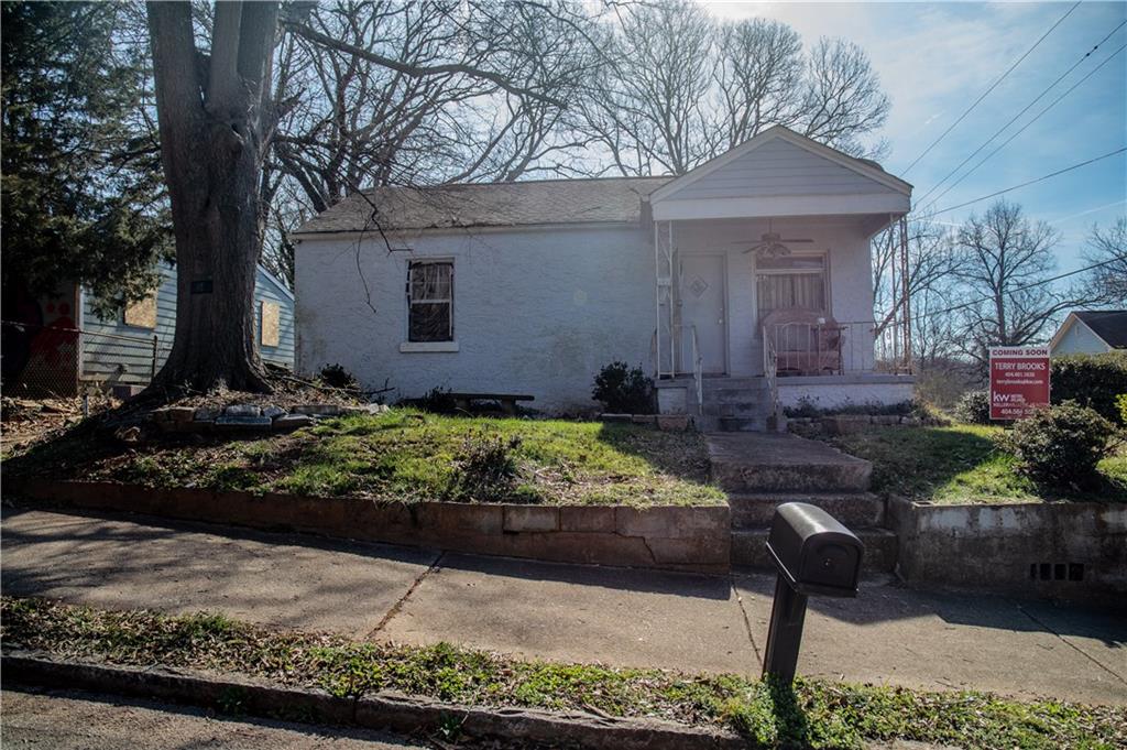 362 Roy Street Southwest Atlanta, GA 30310 - Photo 1 of 1 a front view of a house with garden