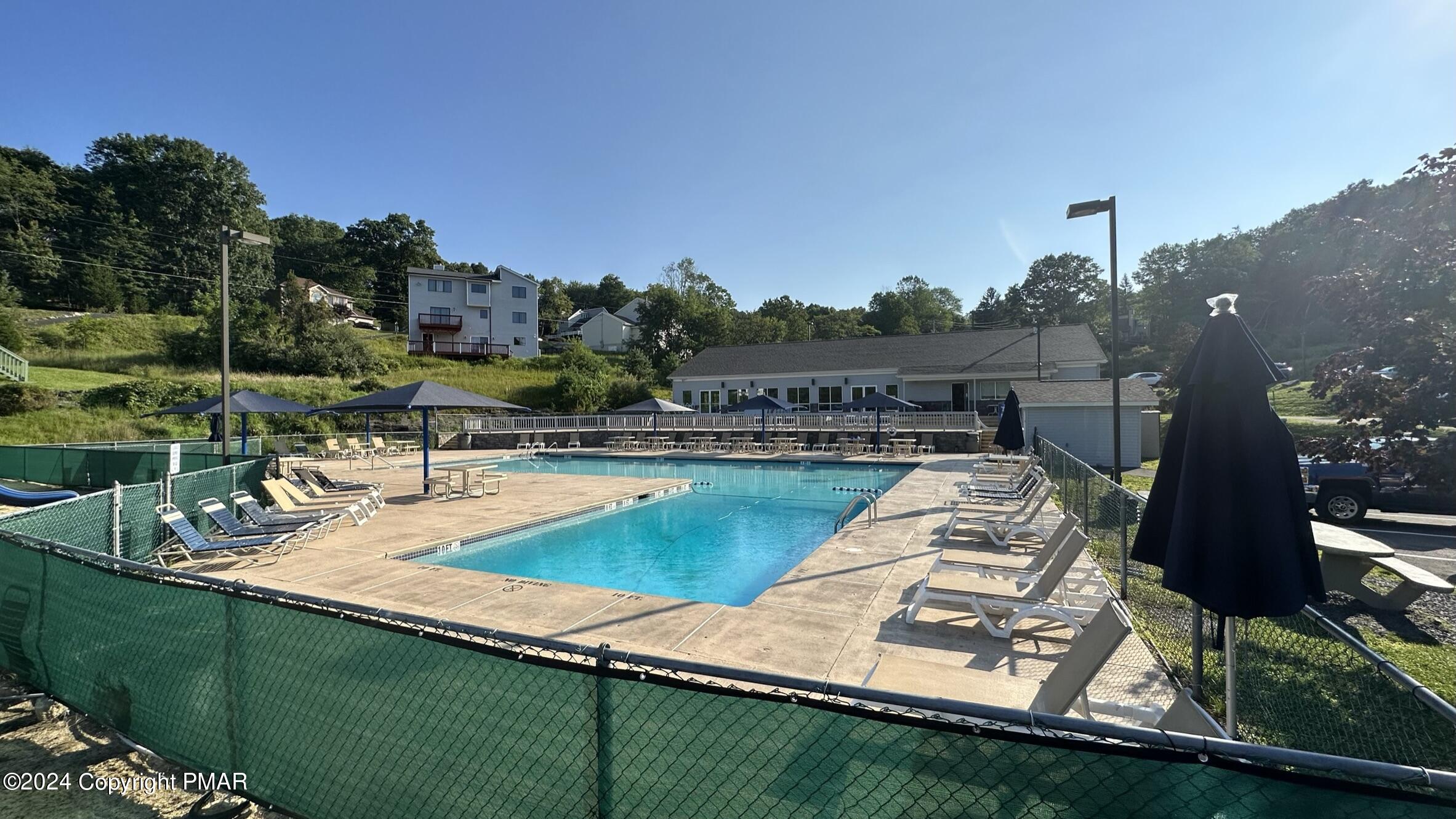 Lot 139 Berkshire Court Bushkill, PA 18324 - Photo 11 of 52 a view of a swimming pool with a yard