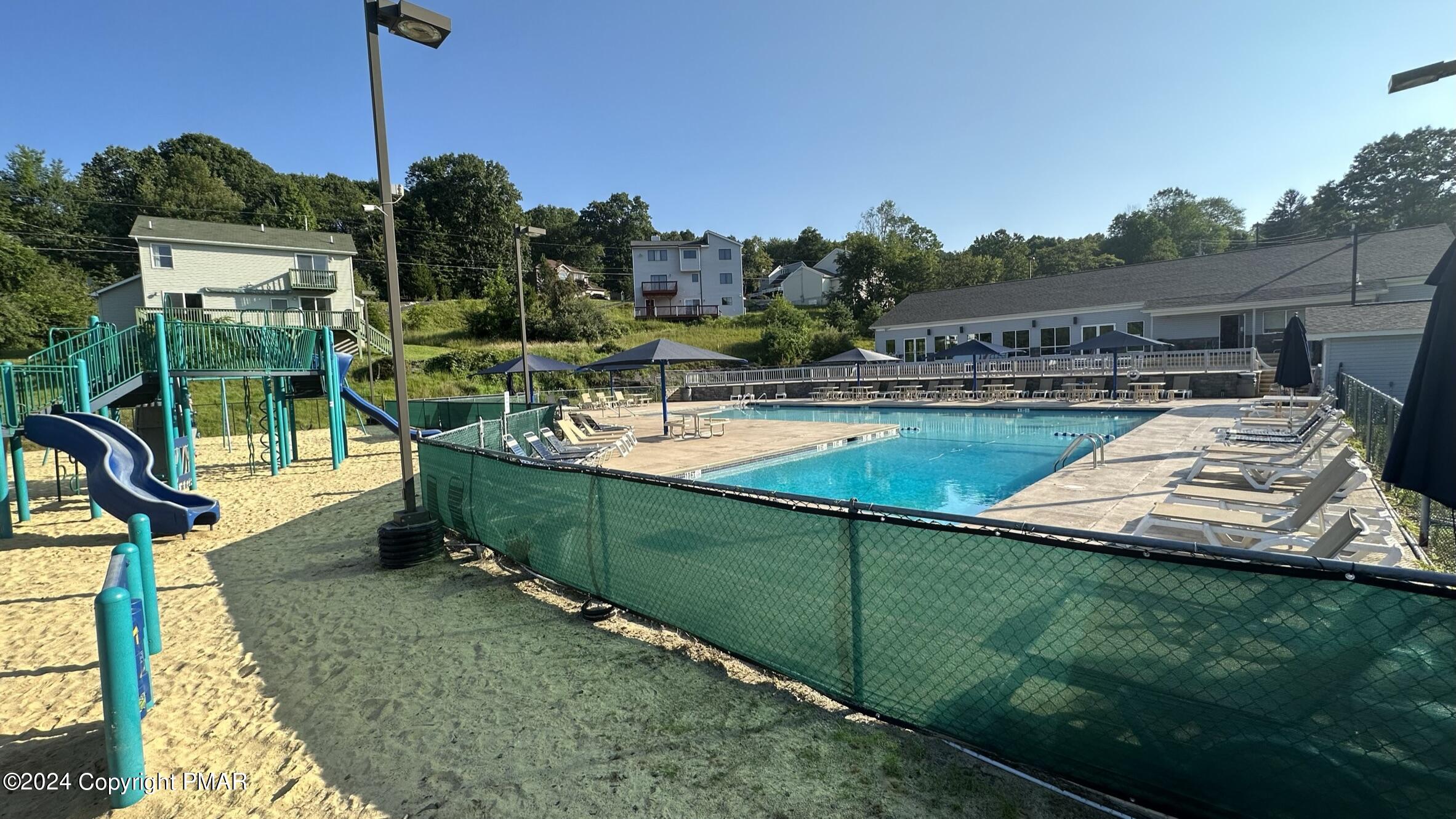 Lot 139 Berkshire Court Bushkill, PA 18324 - Photo 13 of 52 a view of a swimming pool with a patio