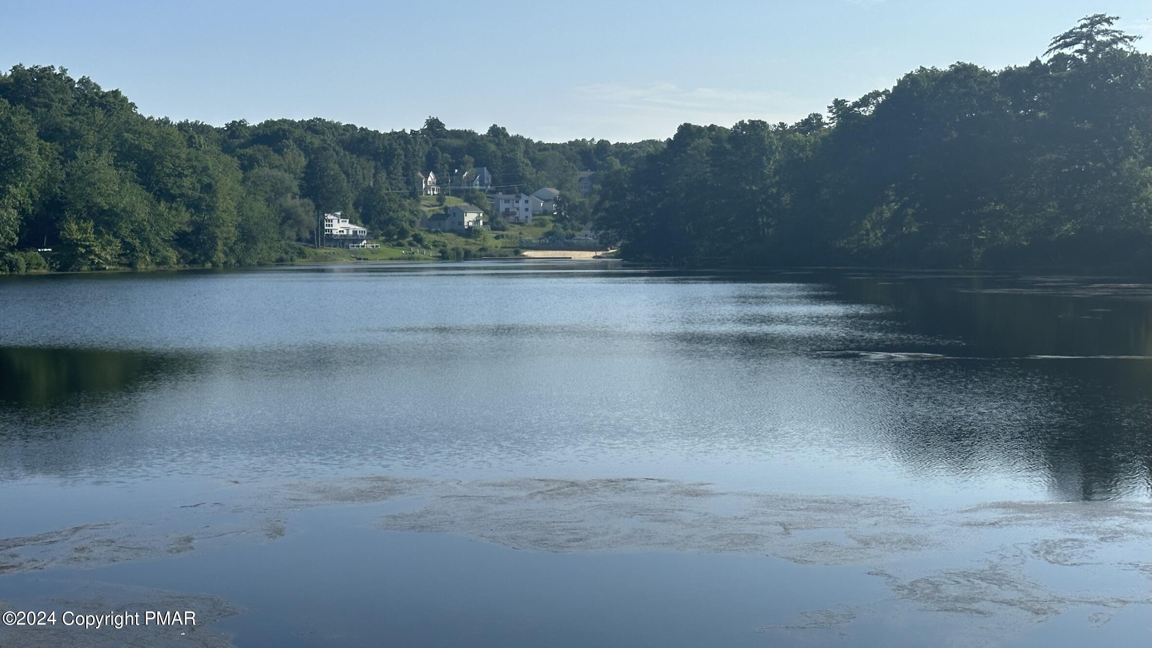 Lot 139 Berkshire Court Bushkill, PA 18324 - Photo 29 of 52 a view of a street with a trees in the background