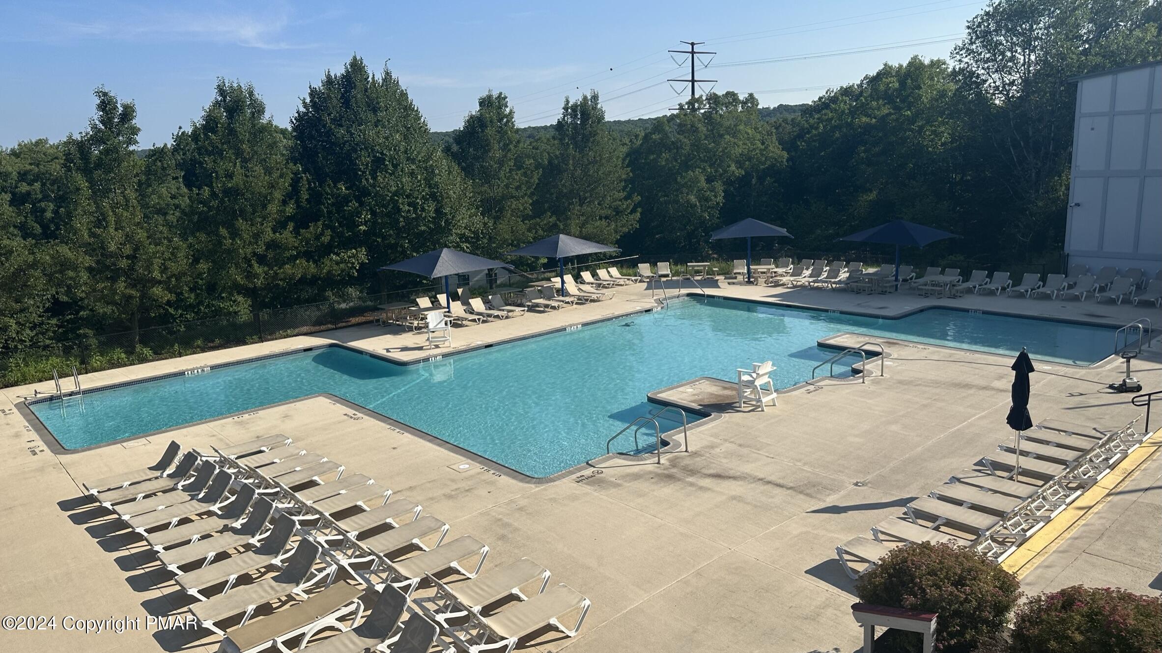 Lot 139 Berkshire Court Bushkill, PA 18324 - Photo 38 of 52 a view of a swimming pool with a yard