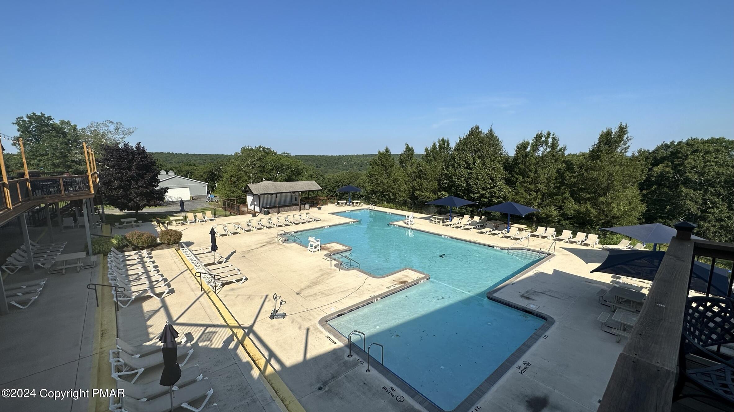 Lot 139 Berkshire Court Bushkill, PA 18324 - Photo 40 of 52 a view of a swimming pool with a patio