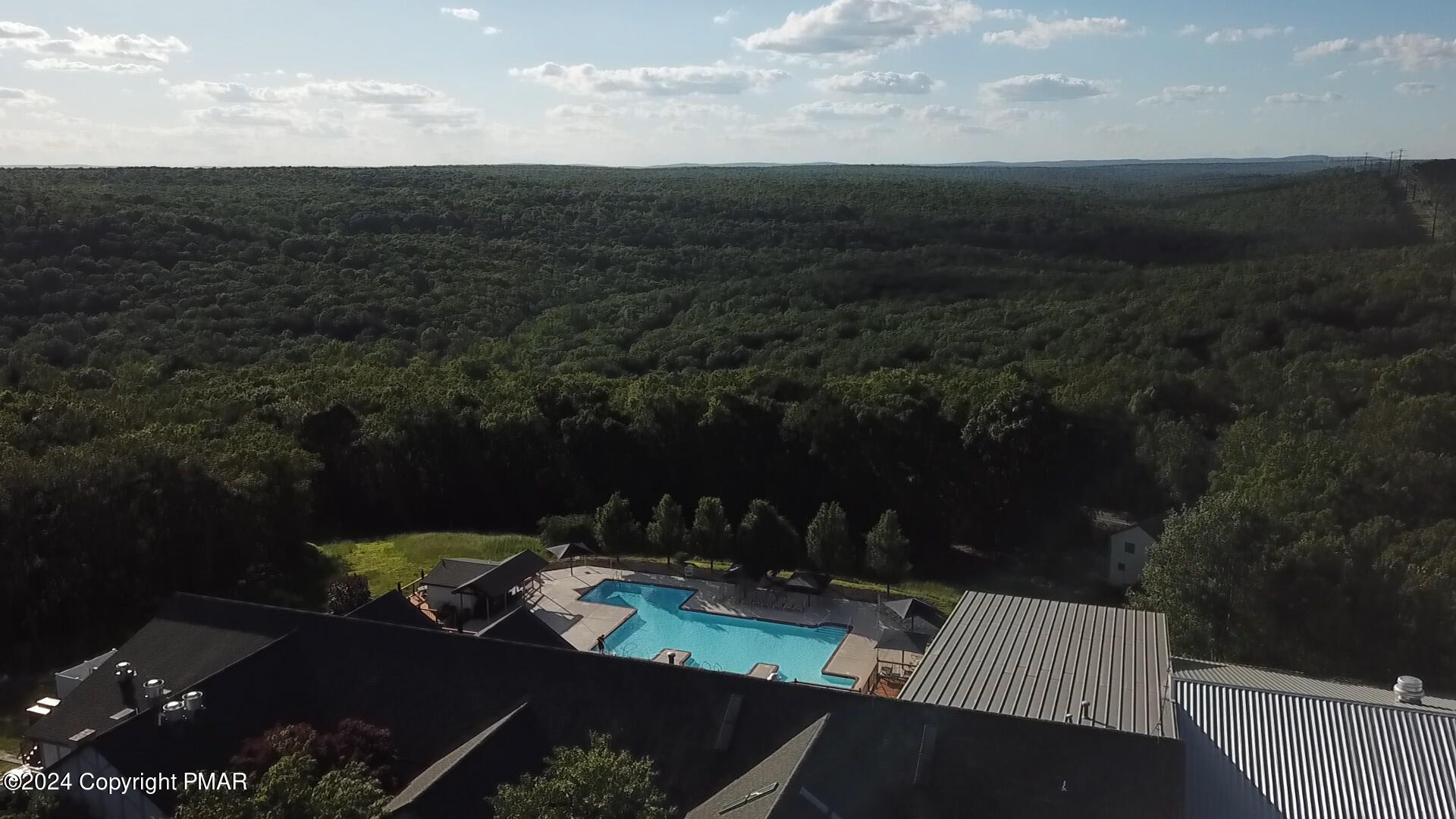 Lot 139 Berkshire Court Bushkill, PA 18324 - Photo 51 of 52 a view of a terrace with furniture and garden