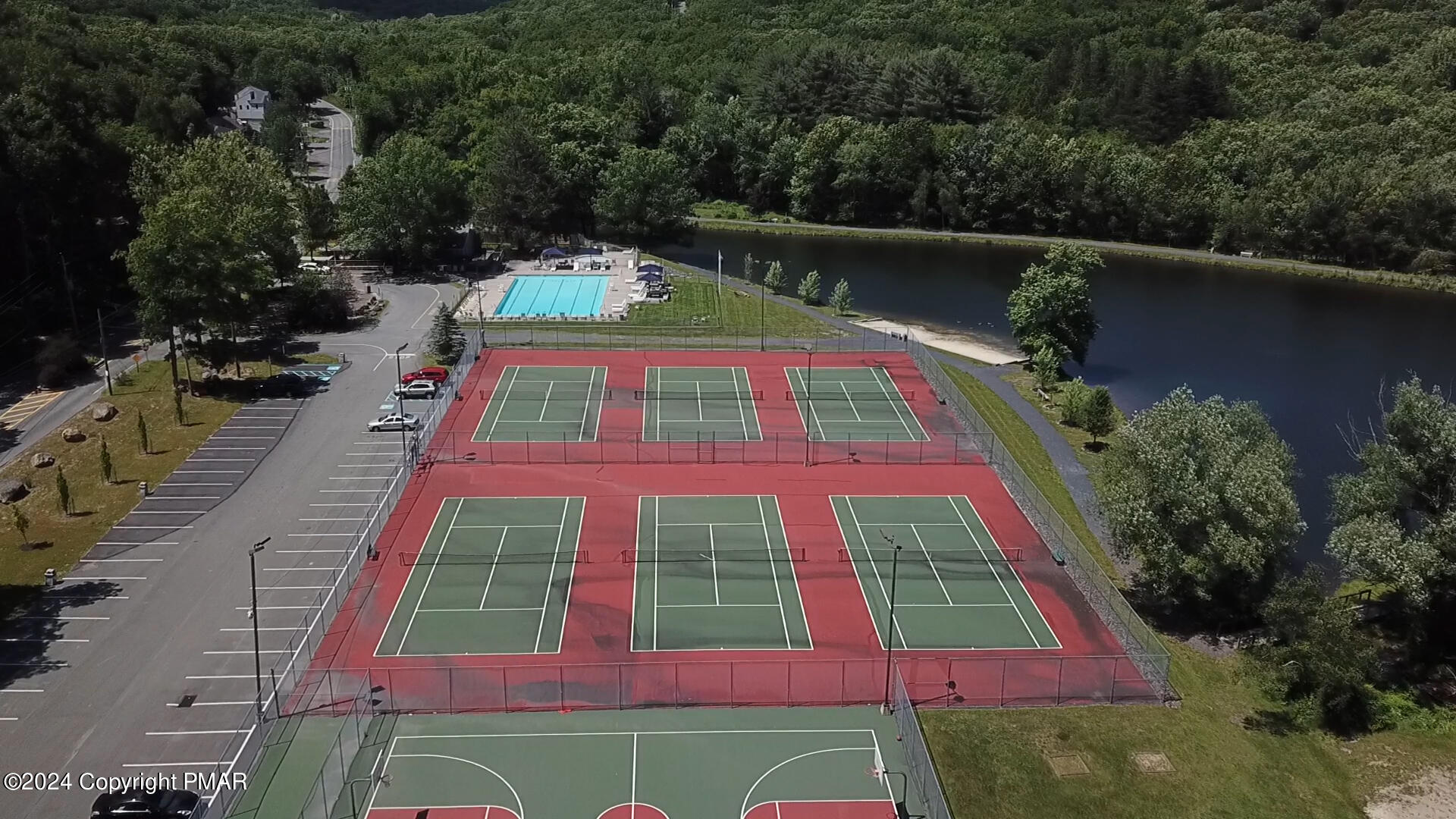 Lot 139 Berkshire Court Bushkill, PA 18324 - Photo 52 of 52 an aerial view of a multi story residential apartment building