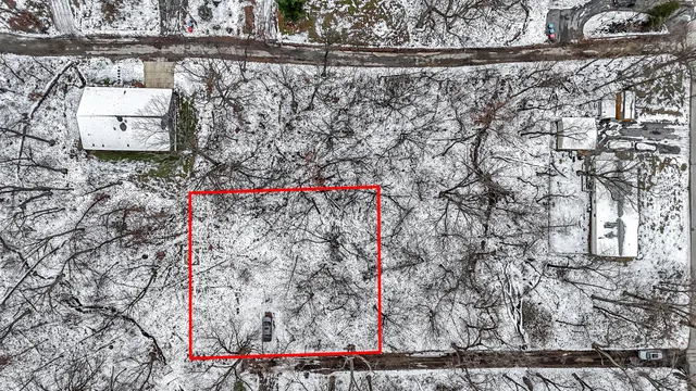 a view of entryway with a trees